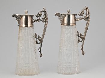 KANNOR, ett par, nysilver, glas, 1900-talets början.