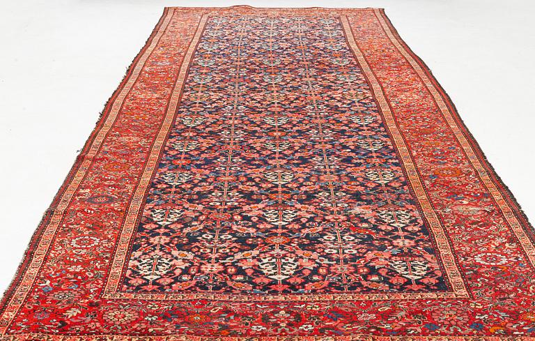 A Farahan carpet, c. 520 x 205 cm.
