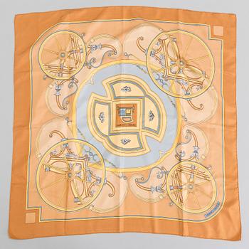 a silk scarf "Washington's Carriage" by Hermés.