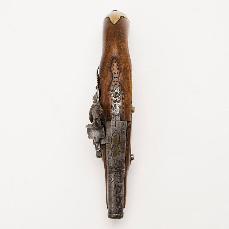 An early 19th Century flintlock pocket pistol.