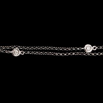 COLLIER, 18 k vitguld, smaragd ca 1.86 ct, briljantslipade diamanter tot ca 0.94 ct.