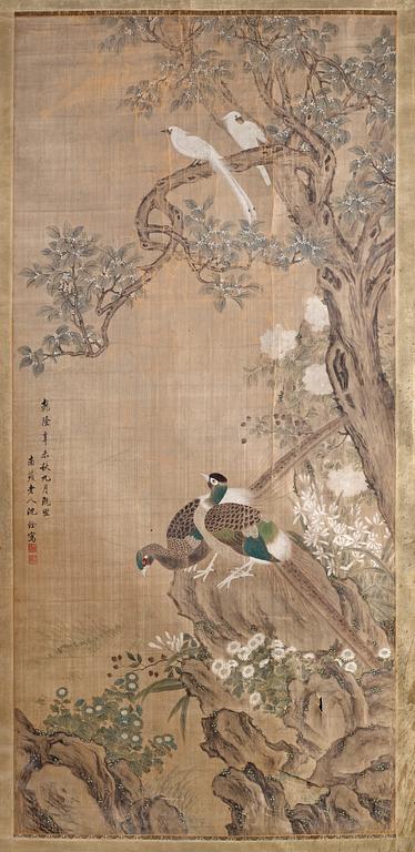 A hanging scroll of birds in a flowering garden. Qing dynasty, presumably 19th Century.