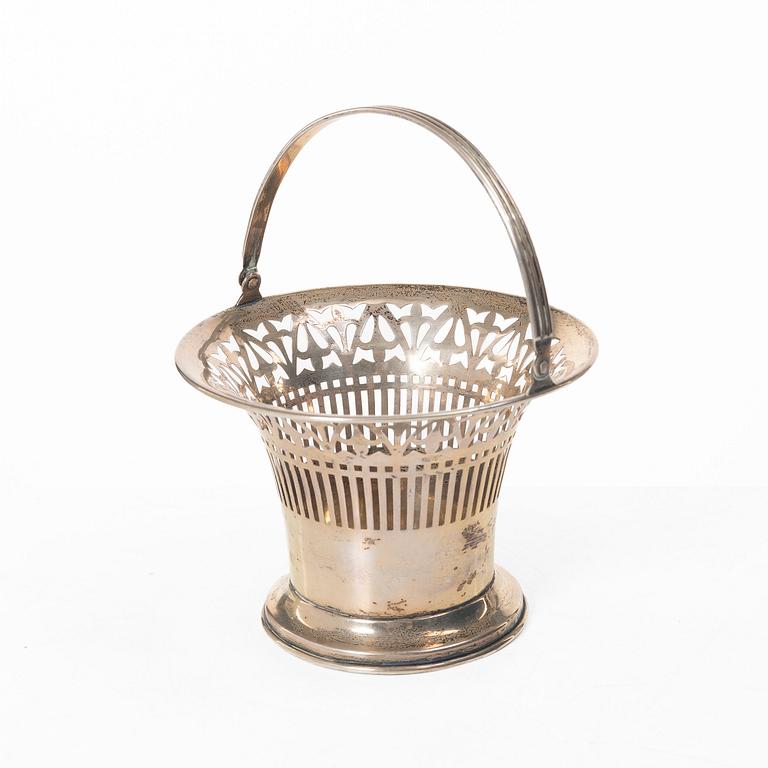 A sterling silver bowl with handle, signed with monogram CMM, 20th century.
