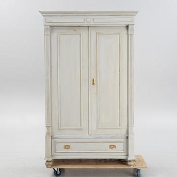 A painted wardrobe, early 20th Century.