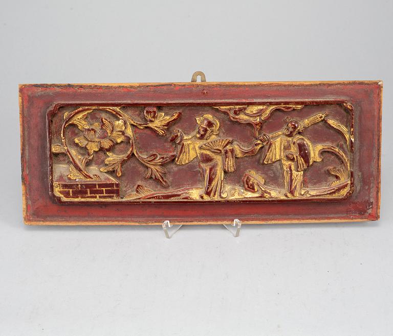 A wooden tray and two panels, Qing dynasty, 19th Century.