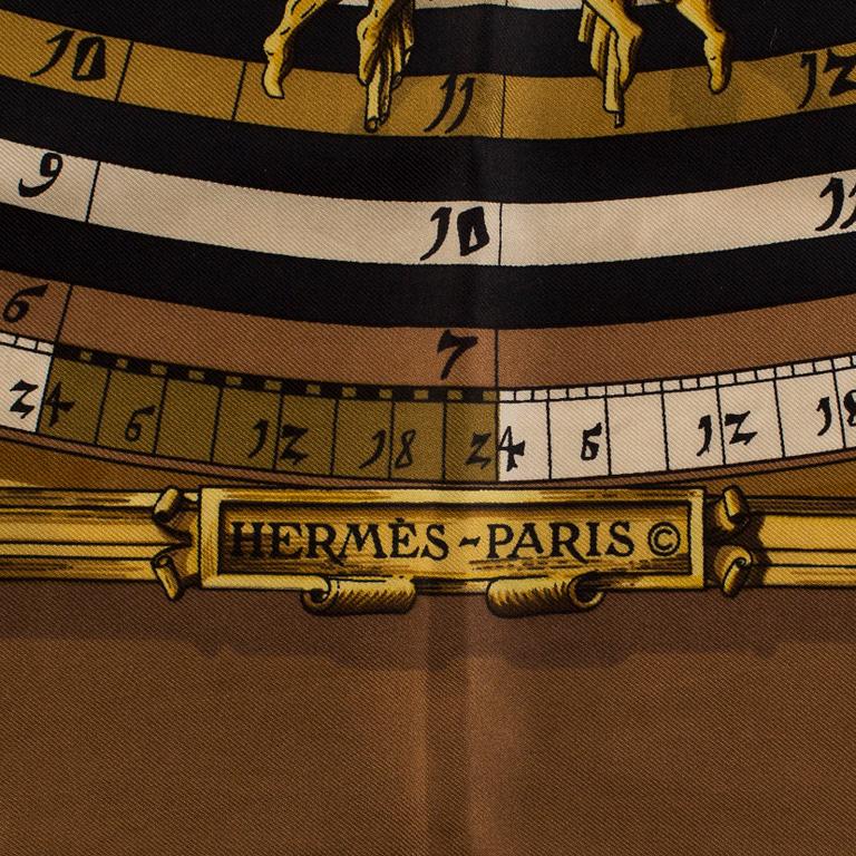 A Hermès silk scarf "Astrologi / Dies et Hore" designed by Francoise Faconnet 1963.