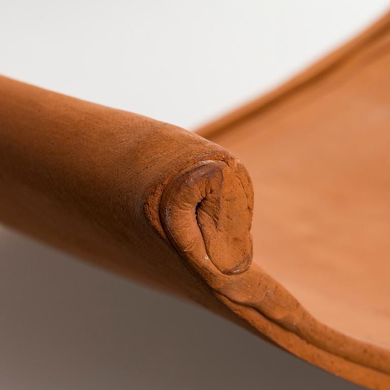 Kyllikki Salmenhaara, a 'winding' red clay sculpture, signed KS.