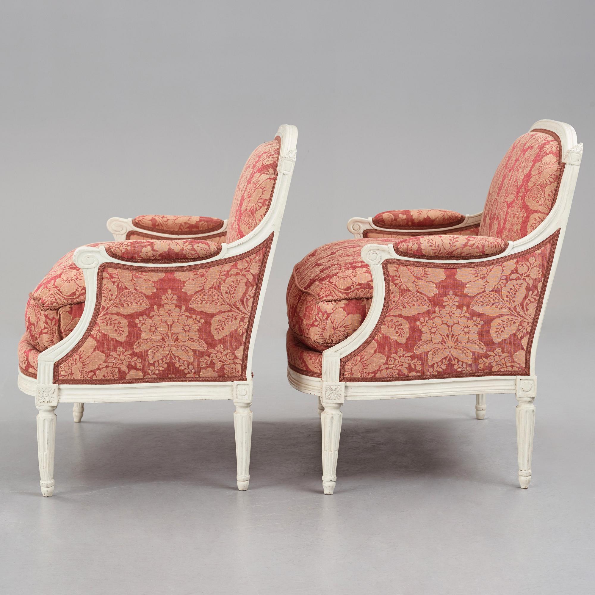 A pair of Louis XVI late 18th Century armchairs by M. dela Porte (Paris 1765-1784).