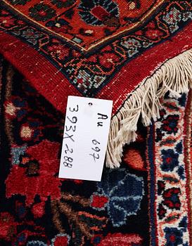 A carpet, antique, Birjand, signed Marghobi, c. 393 x 288 cm.