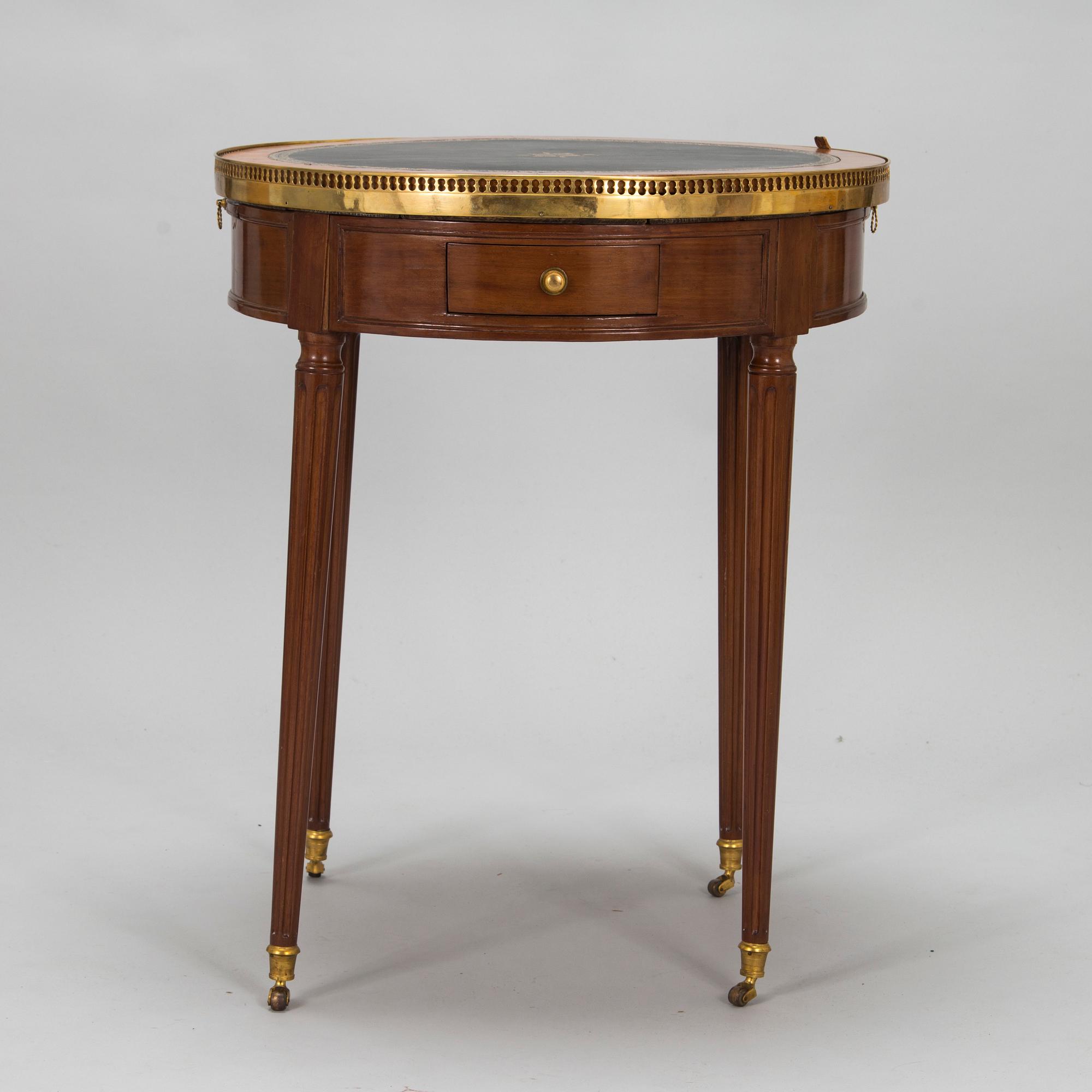 A directoire style coffee table/game table, 19th century.