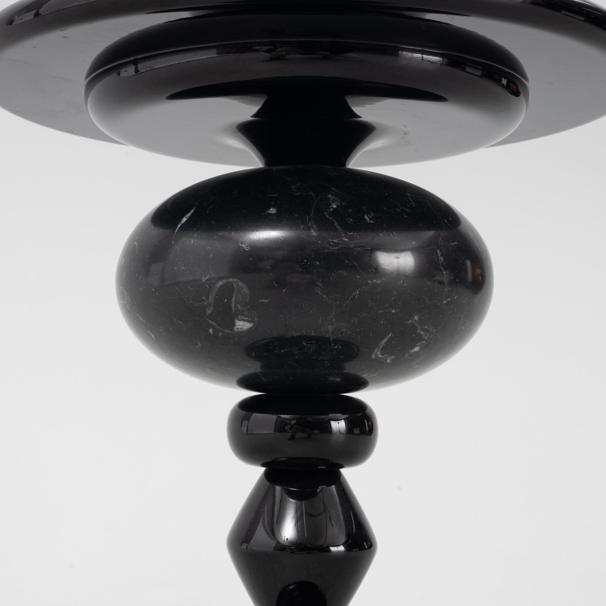 A 'Shuffle' side table from &Tradition, 21st century.