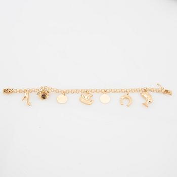 Bracelet 18K gold Bismarck link with charms.