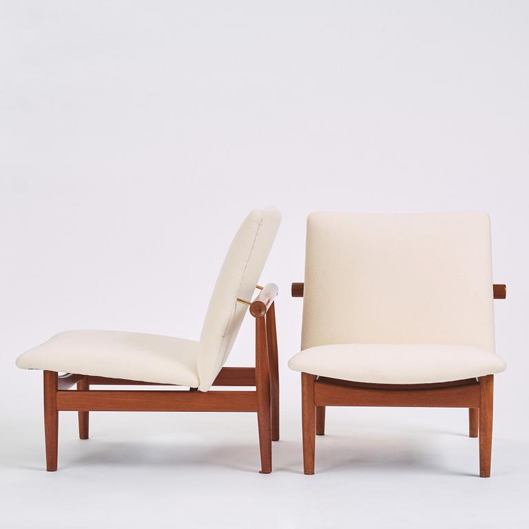 Finn Juhl, a pair of 'Japan' (FD-137) easy chairs and an ottoman, France & Son, Denmark, 1960s.