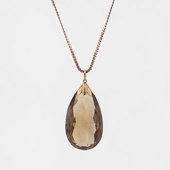 A briolette cut smoky quartz pendant by GVH, Stockholm, 1936.