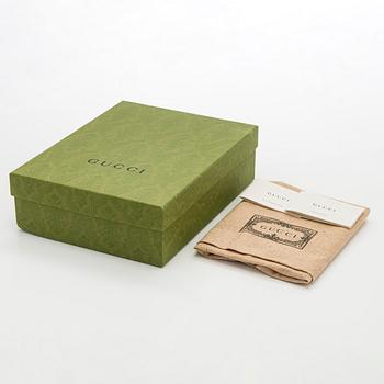 Gucci, "GG Supreme" laukku.