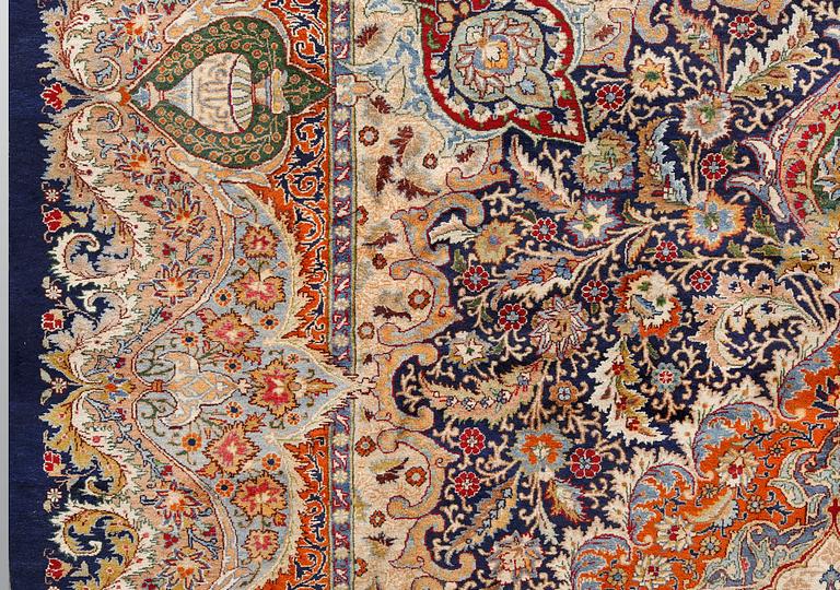 A figural Kashmar carpet, 391 x 306 cm.