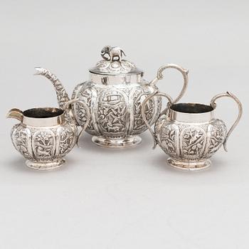 A 3-piece Asian silver tea set, presumably from the mid-20th century.