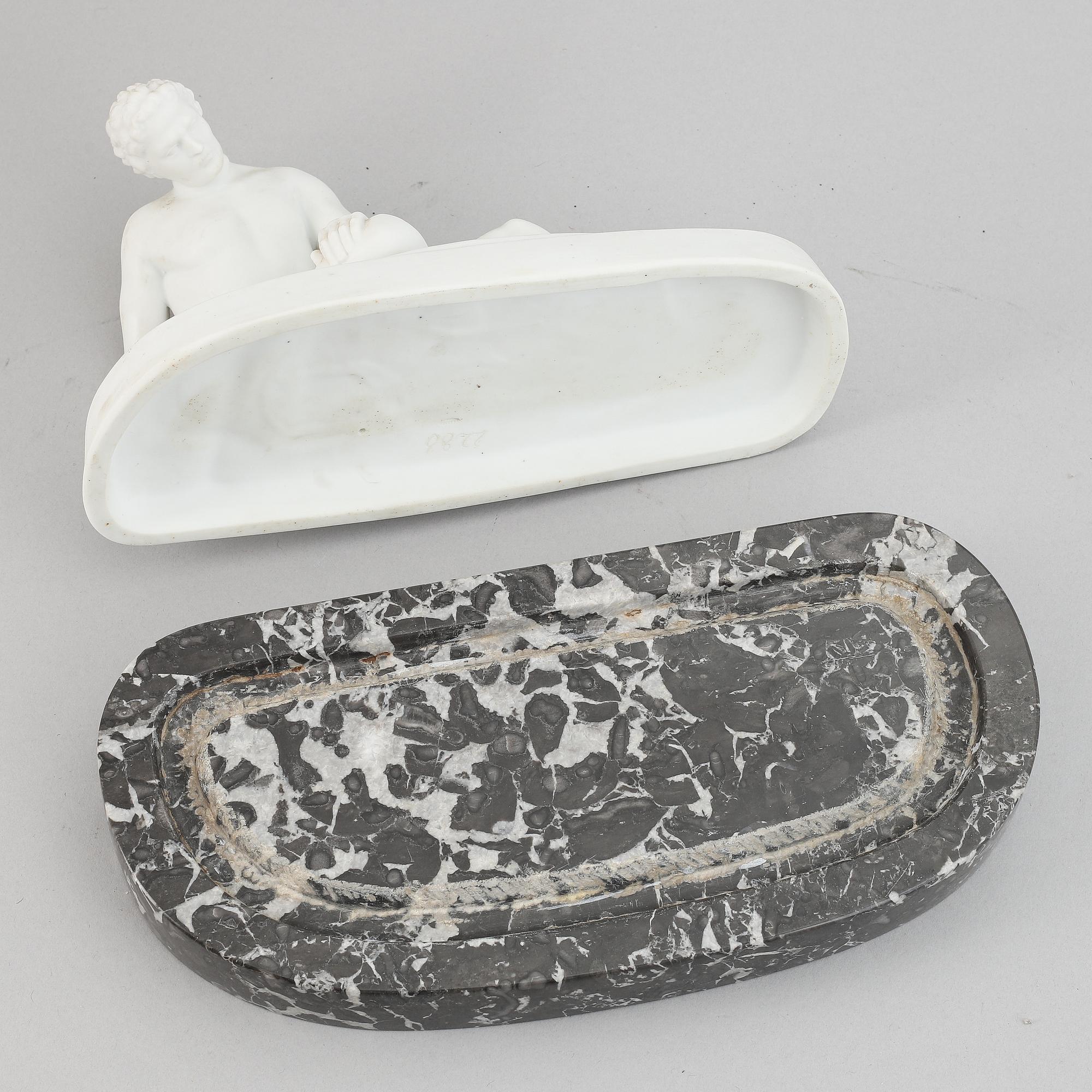 A parian figurine, 'the dying gaul', after an antique sculpture. 20th century.