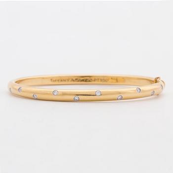 TIFFANY & Co, armring med briljantslipade diamanter ca 0.20 ct.