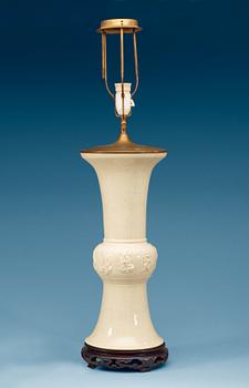 1823. A Chinese bronze shaped white ge glazed vase.