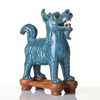A turquoise/robins egg glazed figure of a buddhist lion, Qing dynasty, Jiaqing (1796-1820).
