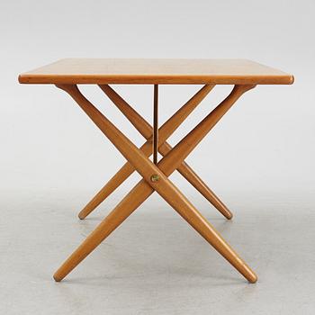 Hans J. Wegner, a 'Savbukkebordet AT 303' dining table, Andreas Tuck, Denmark.