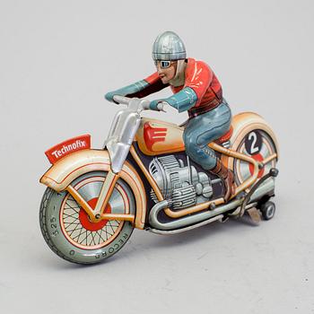 A Technofix tinplate Trick motorcycle, Germany, ca 1950.