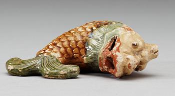 A glazed pottery dragon-carp water dropper, Qing dynasty, Jiaqing, circa 1816.