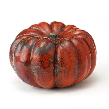 A Hans Hedberg faience sculpture of a pumpkin, Biot, France.