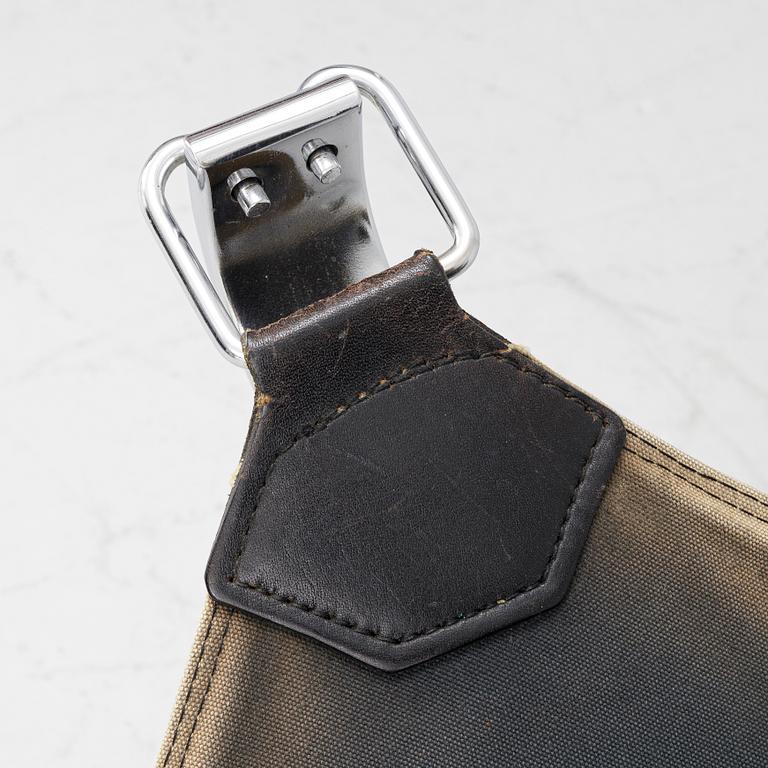 Sigurd Ressel, a pair of 'Falcon chair' easy chairs with an ottoman, Vatne Möbler, Norway, 1970s.