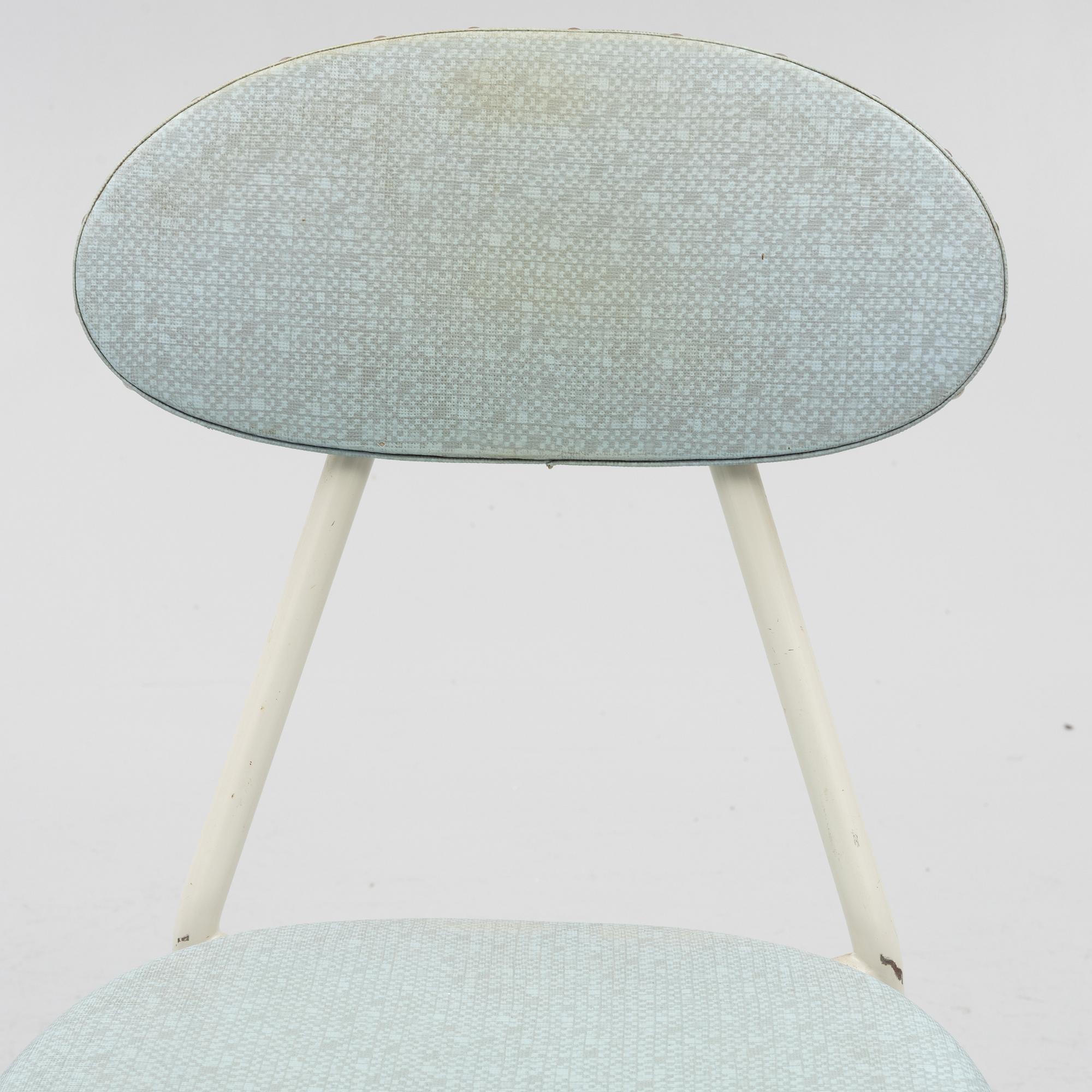 A table and four chairs, mid-20th Century.