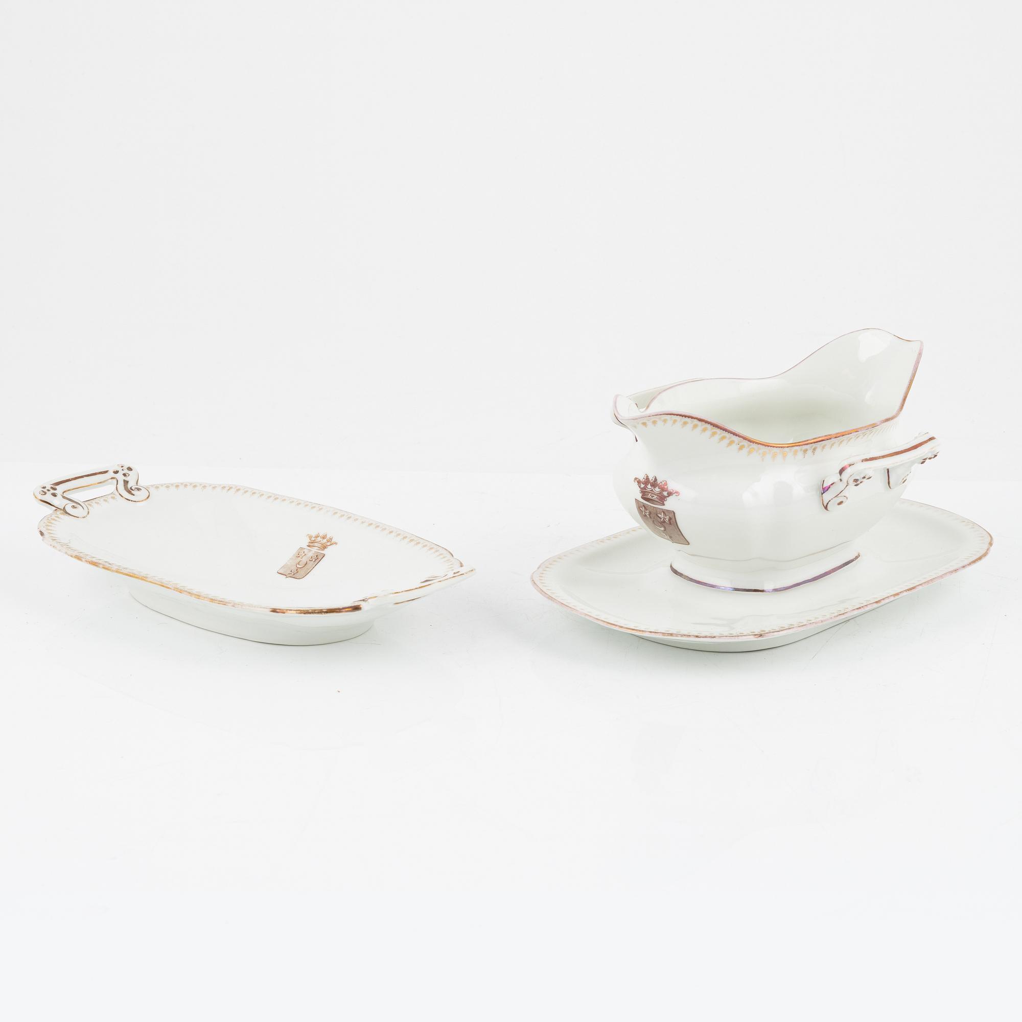 A 82 piece porcelin dinner service, France. With the Hamilton family coat of arms.