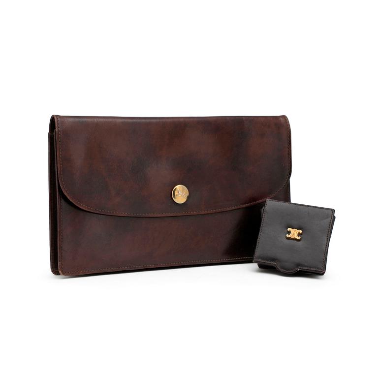 CÉLINE, a brown leather clutch bag and purse.