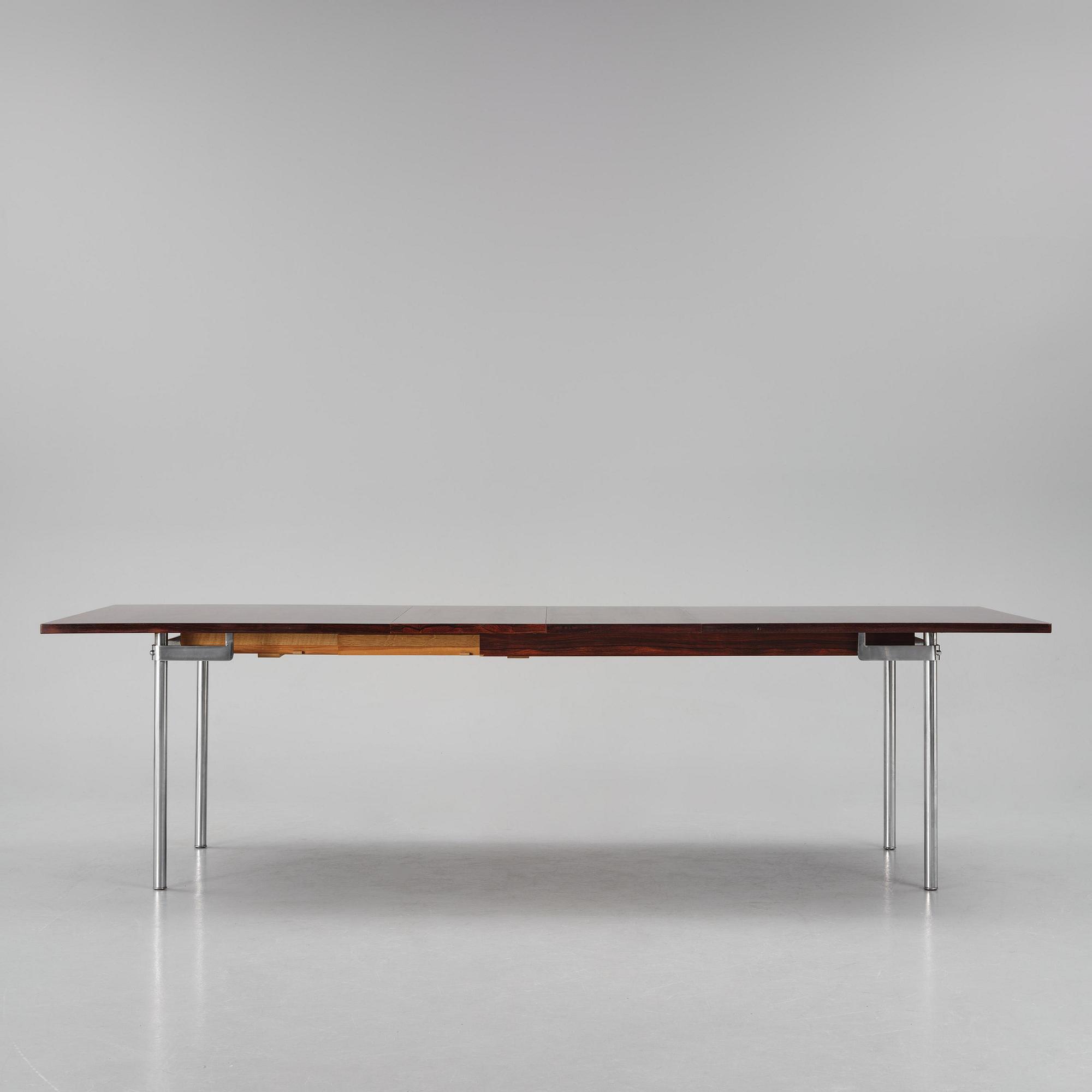 Hans J. Wegner, a rosewood "AT-322" table, Andreas Tuck, Denmark, 1960s.