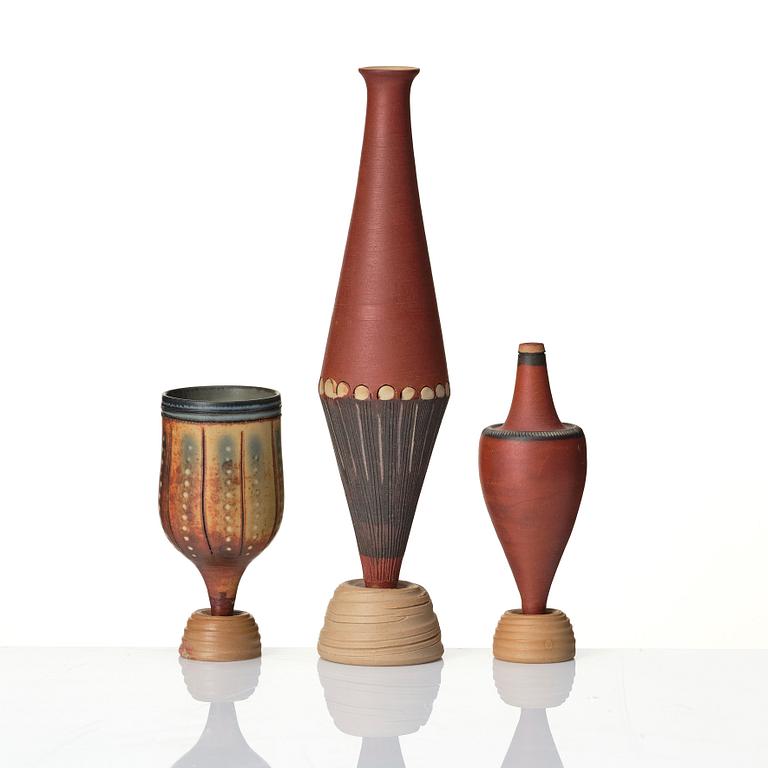 Wilhelm Kåge, a set of three miniature  'Farsta Spirea' stoneware vases, Gustavsberg studio, Sweden, one dated 1958.