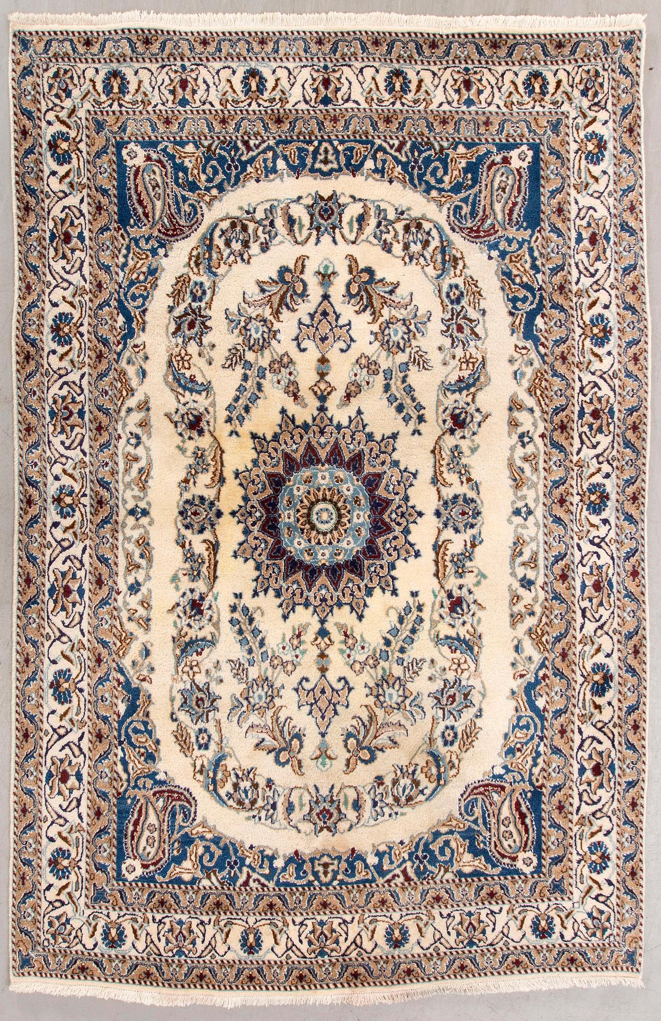 A Nain part silk carpet ca 232x160 cm.