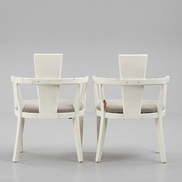 A pair of painted armchairs, first half of the 20th Century.