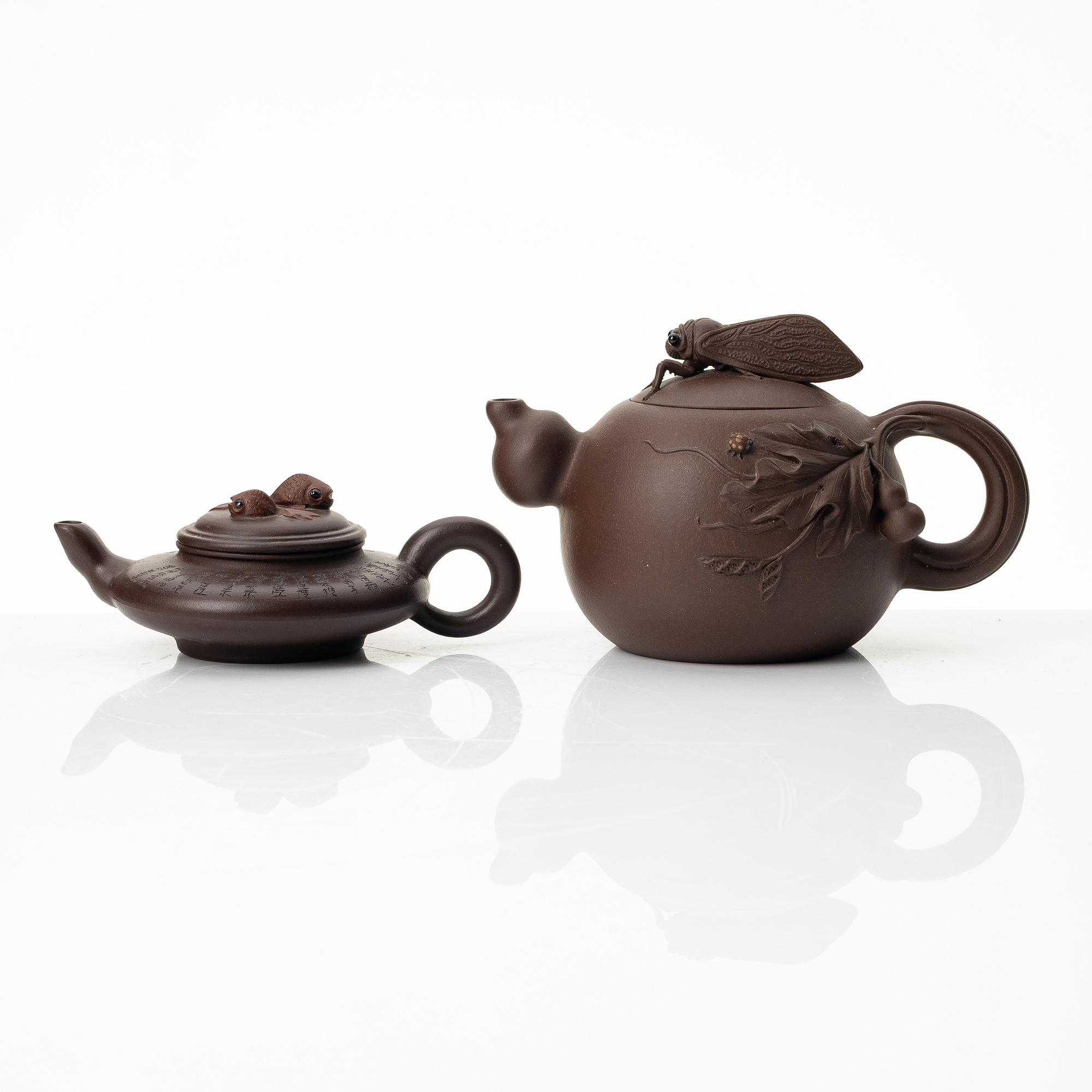 Two yixing teapots, China, 1980s and 2000.