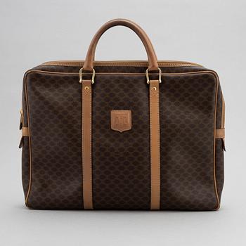 Céline, a monogram canvas briefcase.