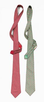 1312. A set of two silk ties by Hermès.