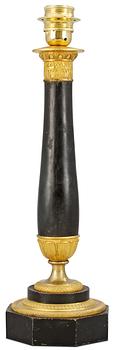 1099. An Empire table lamp.