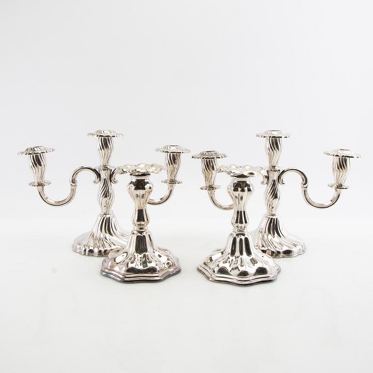 Candelabras a pair and candlesticks a pair Rococo style silver plate 20th century.