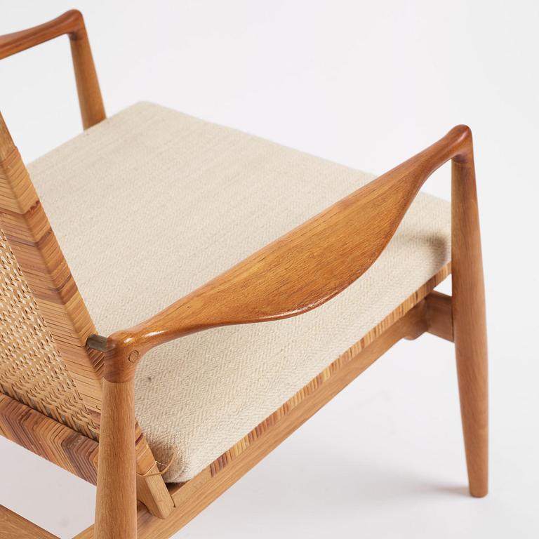 Finn Juhl, a pair of "SW 96" easy chairs, Søren Willadsen, Denmark.