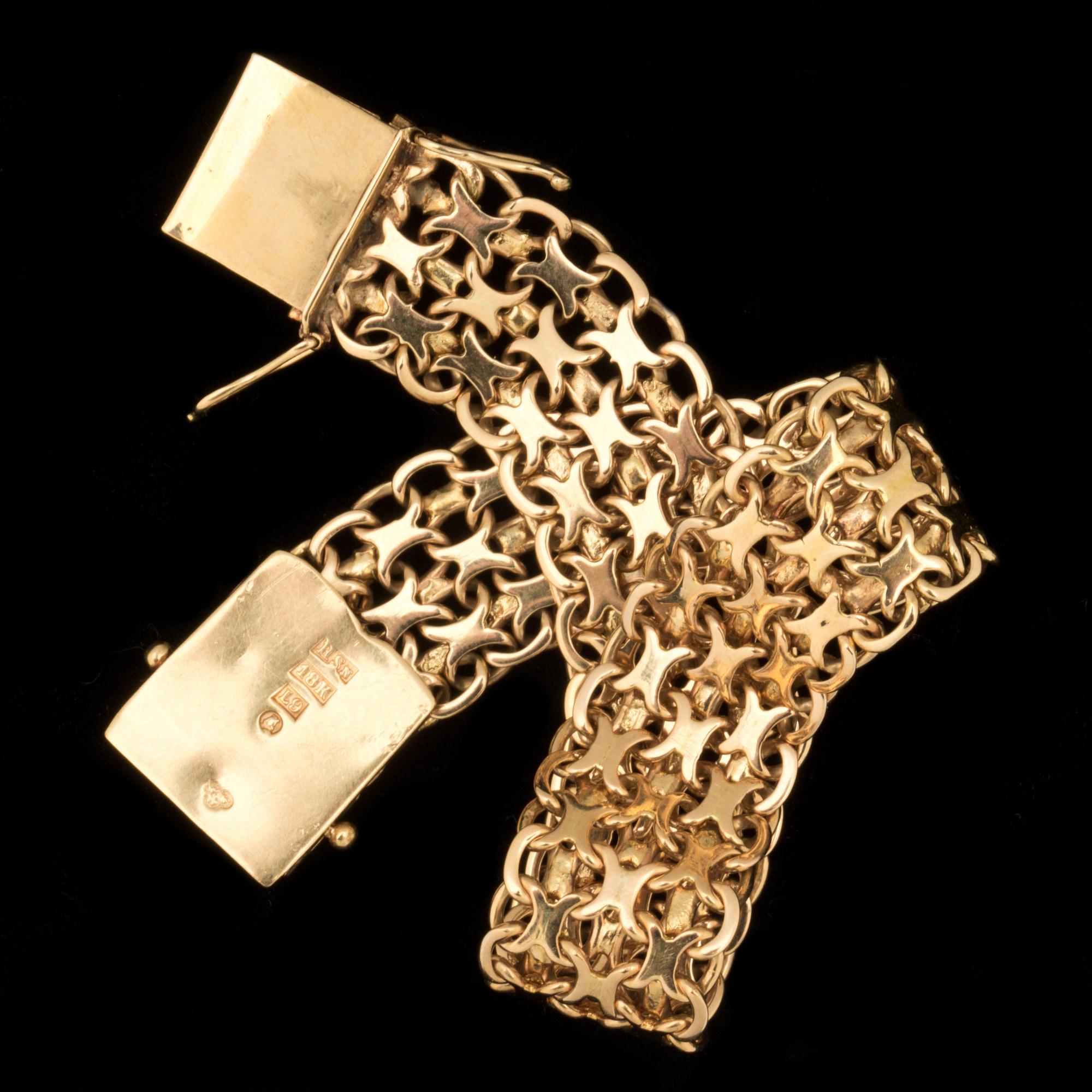 ARMLÄNK, 18 k guld, x-länk. Vikt ca 28 g. Guld- Och Silversmedjan H Svensso, 1961.