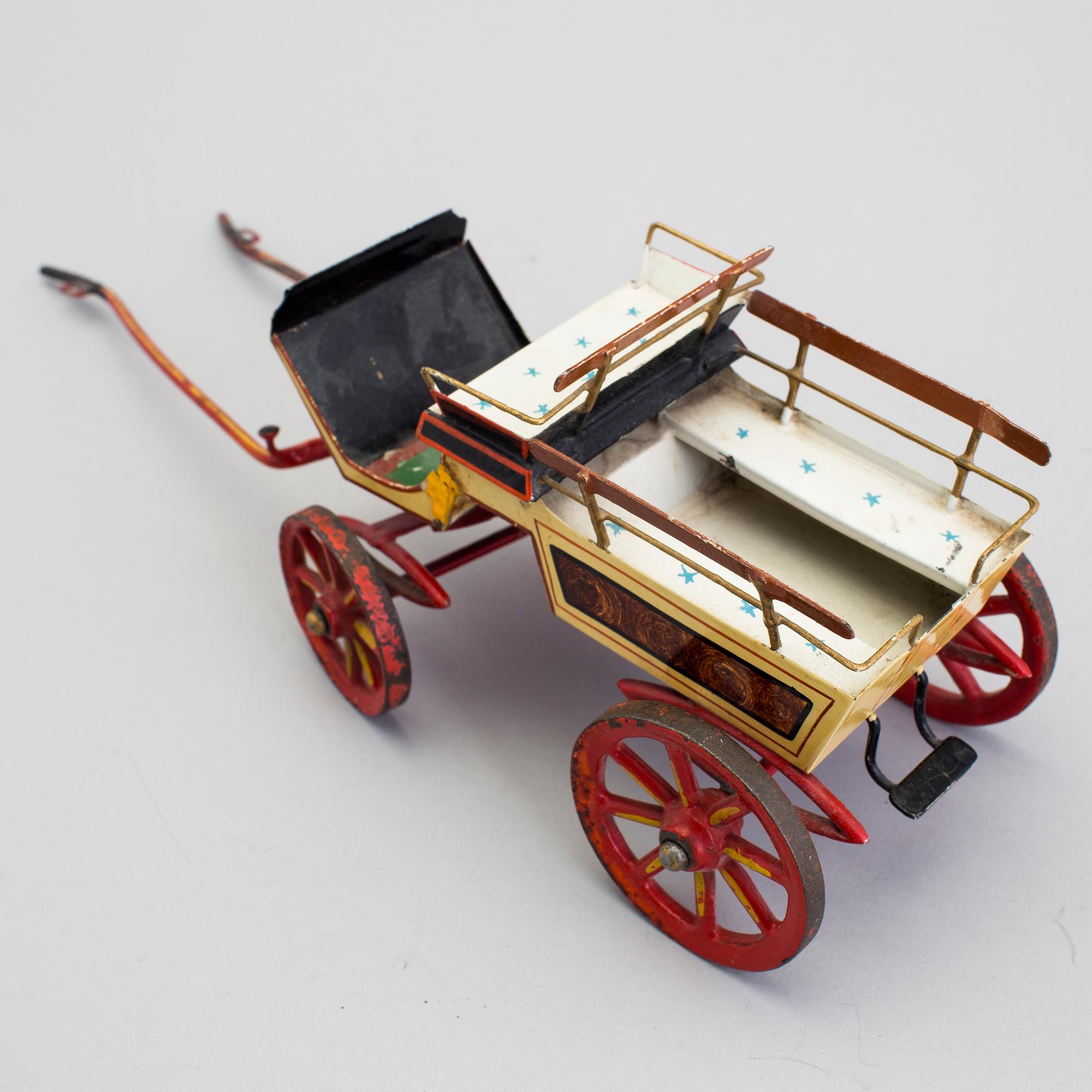 A painted metal horse carriage Germany c 1890-1900.