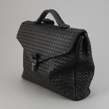 Bottega Veneta, a black intrecciato leather briefcase.