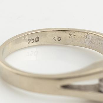 Ring, 18K white gold and four brilliant-cut diamonds.