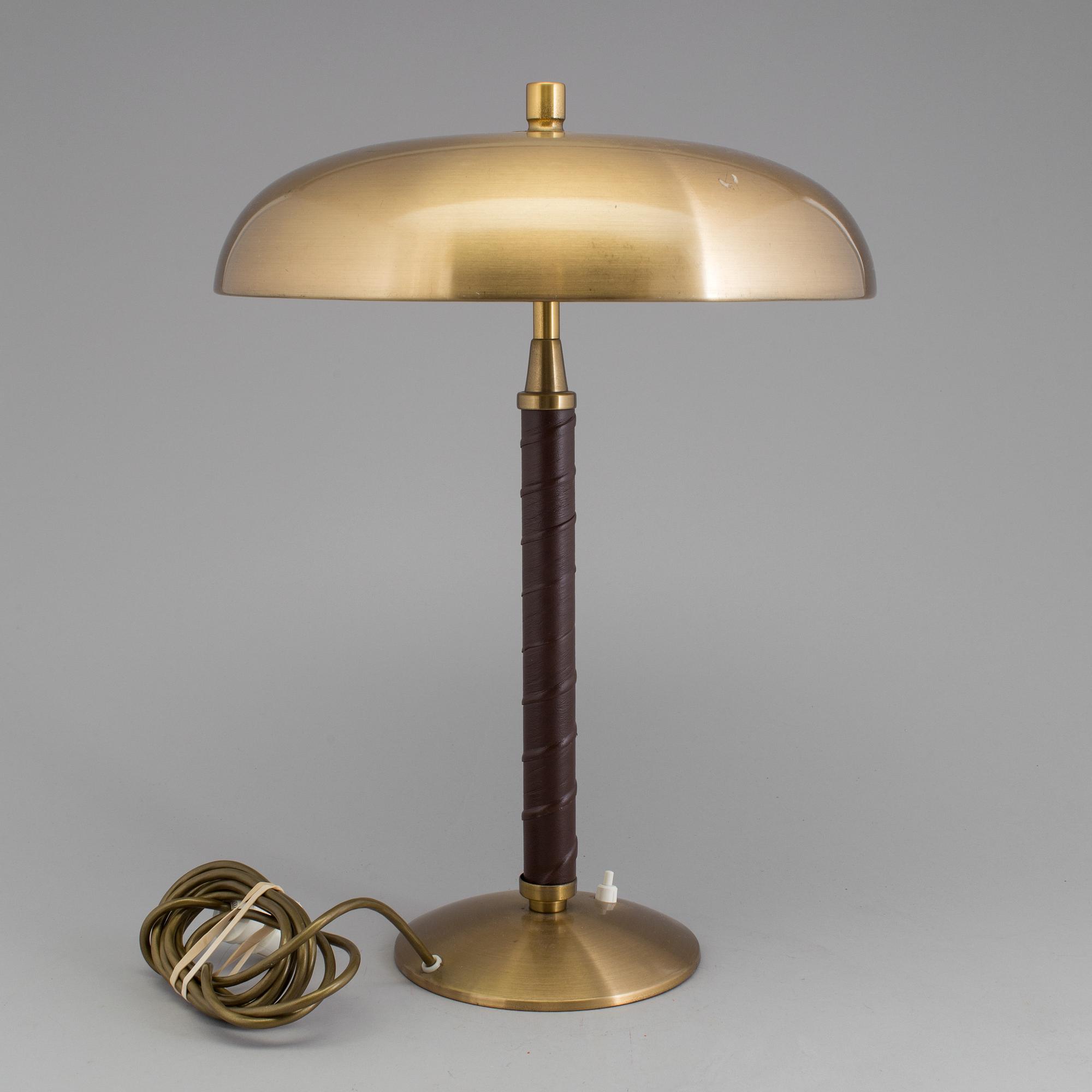A Swedish 20th century brushed brass table lamp by Einar Bäckström, Malmö.