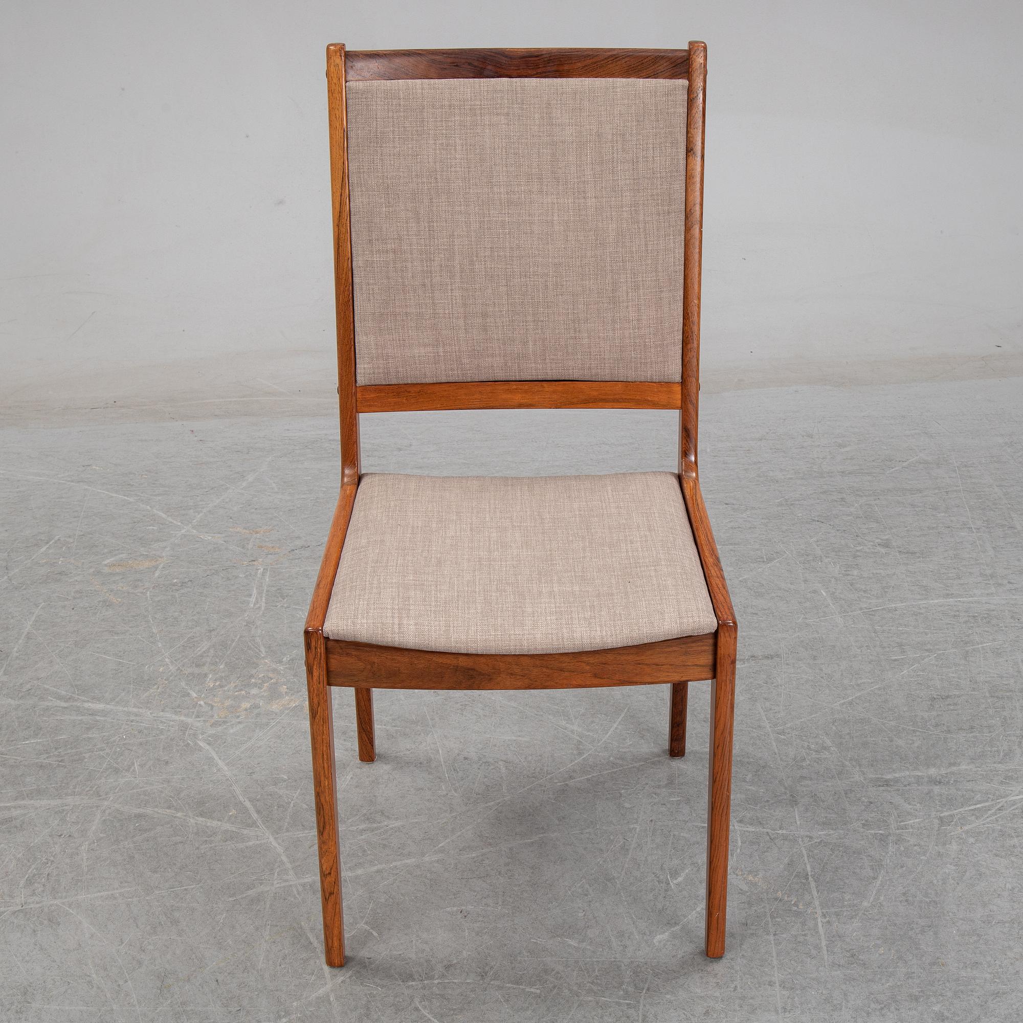 A seven-piece rosewood dining suite, 1960's/70's.