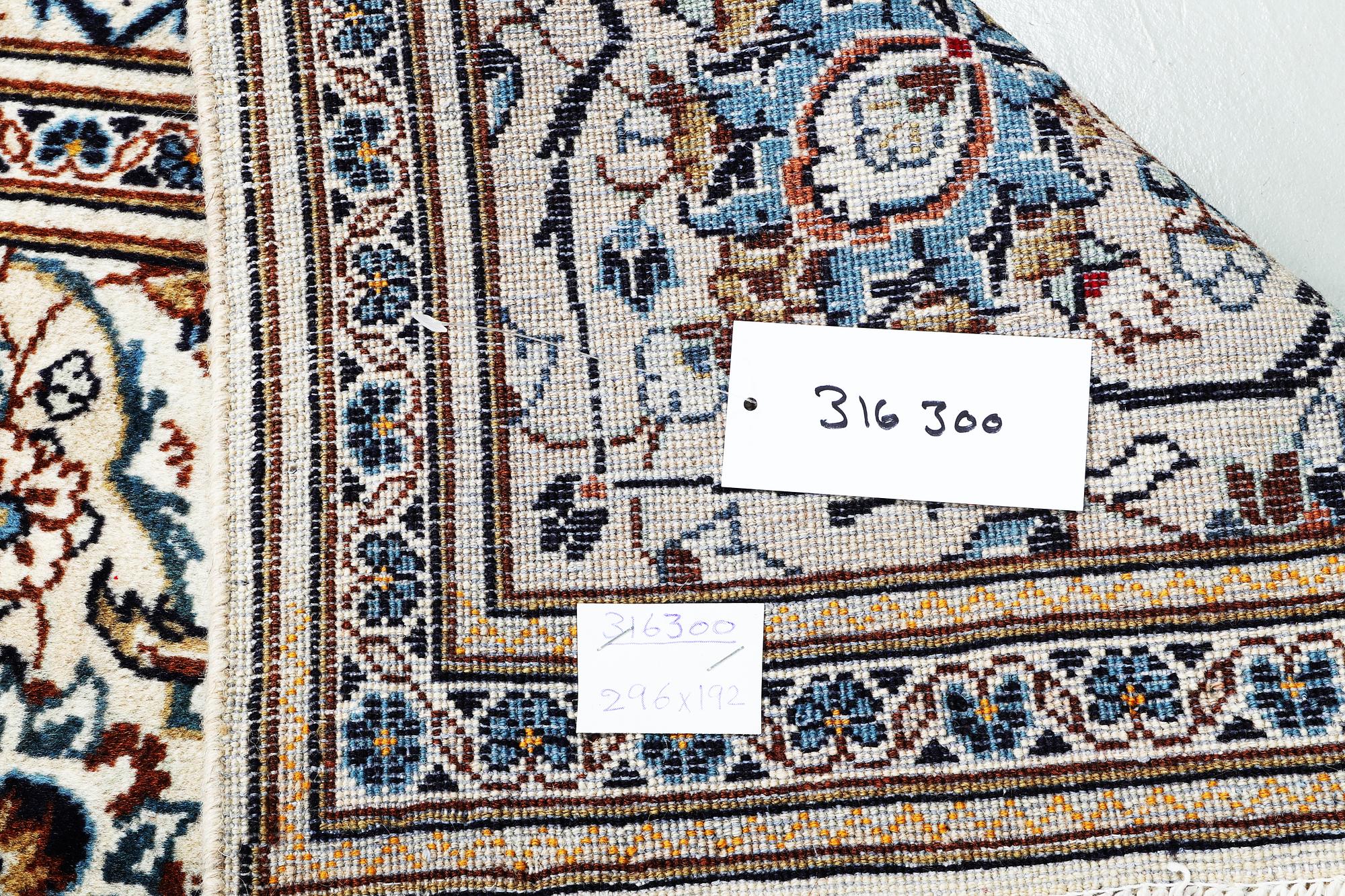 A carpet, Kashan, ca 296 x 192 cm.